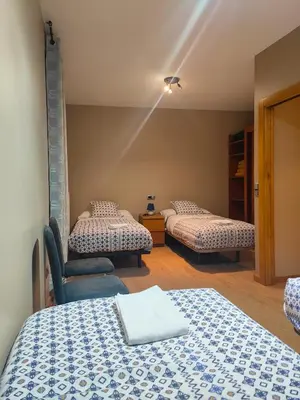 Cama o camas de una habitación en Aiestaenea Apartamentos Rurales