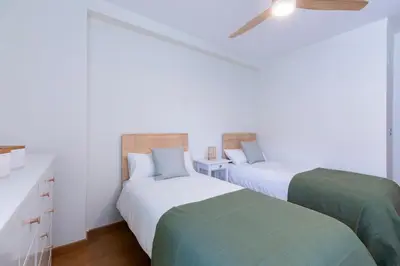 Cama o camas de una habitación en Tu Hogar en el Pirineo Aventura y Montaña