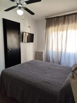 Cama o camas de una habitación en Hostal Castilla