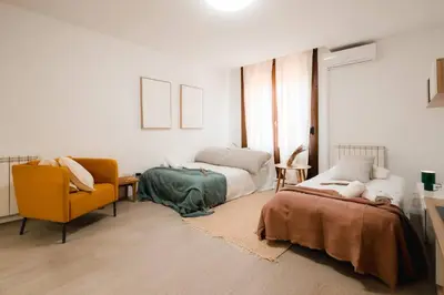 Cama o camas de una habitación en Casa Augusta | Renovada | Centro Histórico | 5 Pax
