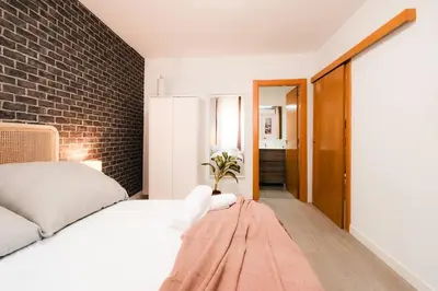 Cama o camas de una habitación en Casa Augusta | Renovada | Centro Histórico | 5 Pax
