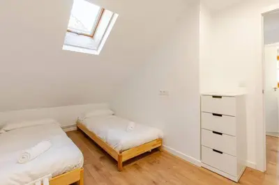 Cama o camas de una habitación en Los Arcos de Escarrilla