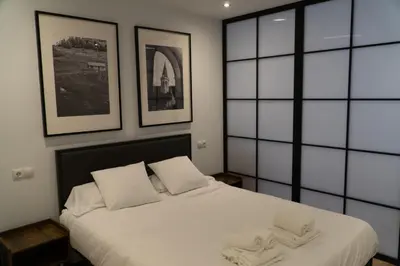 Cama o camas de una habitación en La Borda del Gato Rafa