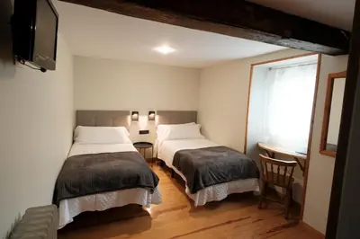 Cama o camas de una habitación en Hosteria de Zubiri