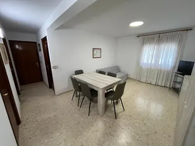 Una televisión o centro de entretenimiento en Castelserás apartamento rural