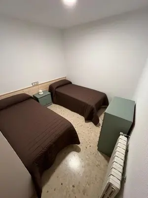 Cama o camas de una habitación en Castelserás apartamento rural