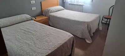 Cama o camas de una habitación en Hostal Casa Casado