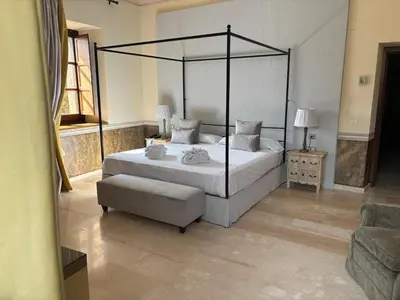 Cama o camas de una habitación en Hospedería del Monasterio de Rueda