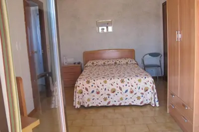 Cama o camas de una habitación en Hostal Casa Pepe