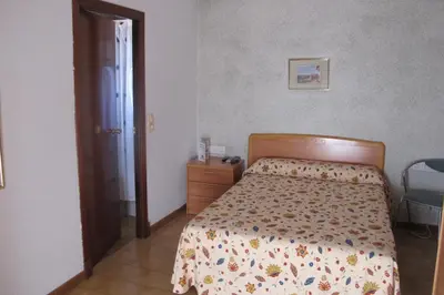 Cama o camas de una habitación en Hostal Casa Pepe