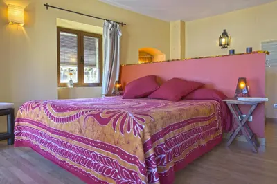 Cama o camas de una habitación en Ruta del Tiempo