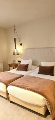 Cama o camas de una habitación en Hotel Fonfreda