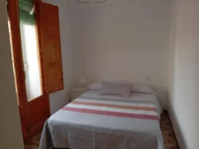 Cama o camas de una habitación en central apartment in Caspe