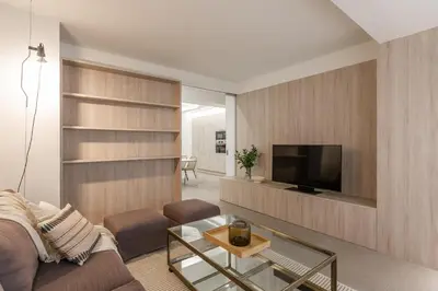 Una televisión o centro de entretenimiento en Apartamentos Kyns