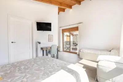 Cama o camas de una habitación en Cova Cuberes
