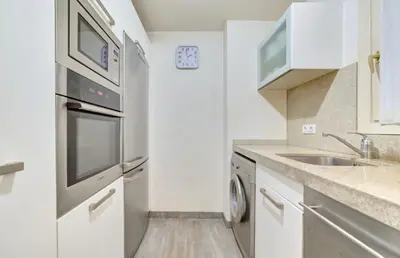 Una cocina o zona de cocina en Experience the running of the bulls from your balcony