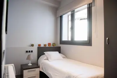 Cama o camas de una habitación en WinTuWin Apartments