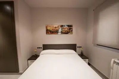 Cama o camas de una habitación en WinTuWin Apartments