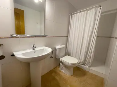 Un baño de Apartamentos Zaragoza Suites El Pilar 3000
