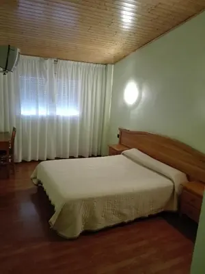Cama o camas de una habitación en Hotel Restaurant Casa Miquel