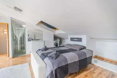 Cama o camas de una habitación en Stylish Duplex in the heart of Zaragoza