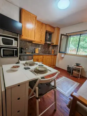 Una cocina o zona de cocina en Tu refugio cómodo y con piscina - Herbasabina 2