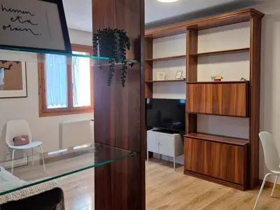 Una televisión o centro de entretenimiento en Apartamento Uxín