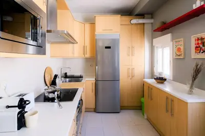Una cocina o zona de cocina en Ático Alfonso | Amplio Céntrico Renovado | 10 Pax