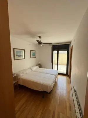 Cama o camas de una habitación en El teu habitatge a Tremp
