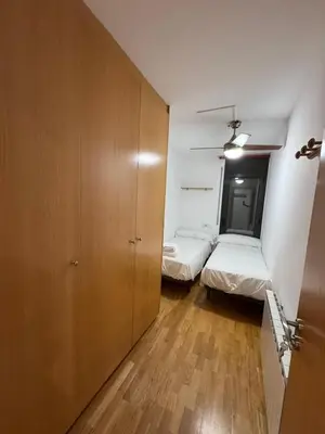 Cama o camas de una habitación en El teu habitatge a Tremp