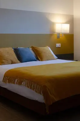 Cama o camas de una habitación en Apartamentos con encanto entre naturaleza, rutas y bodegas - Casa Albañil