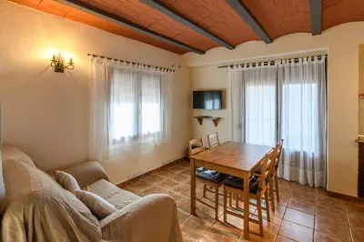 Una televisión o centro de entretenimiento en Casa El Mirador