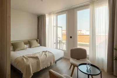 Cama o camas de una habitación en Líbere Pamplona Universidad