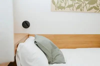 Cama o camas de una habitación en Hostal Ainhoa