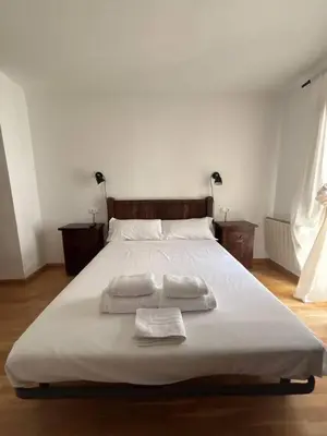 Cama o camas de una habitación en Los caballos Ordesa l Garaje l Céntrico