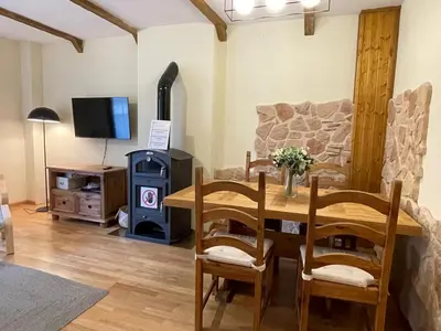 Una televisión o centro de entretenimiento en Casa Calma Villanúa