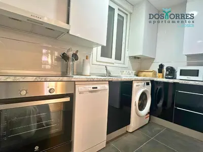 Una cocina o zona de cocina en Dos Torres La dulcería Diseño y calma en pleno centro
