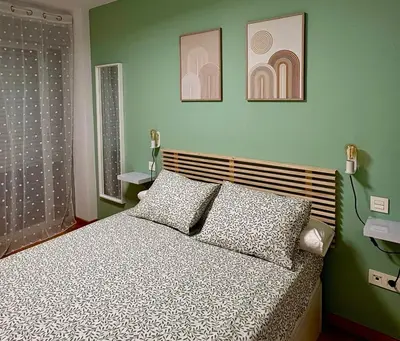 Cama o camas de una habitación en Apartamento Blesino