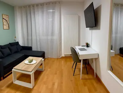 Una televisión o centro de entretenimiento en Apartamento Blesino