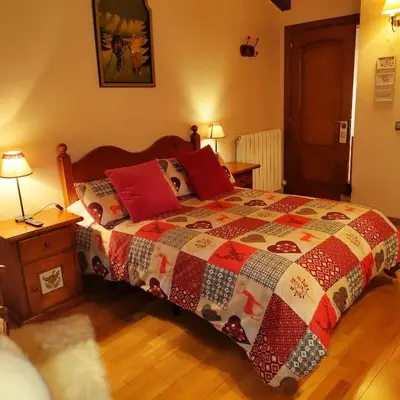 Cama o camas de una habitación en La Llardana