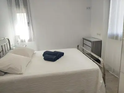 Cama o camas de una habitación en El Rincón de San Fermín