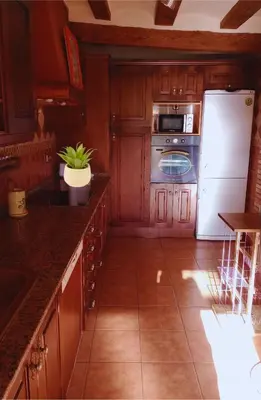 Una cocina o zona de cocina en Piso a orillas del río