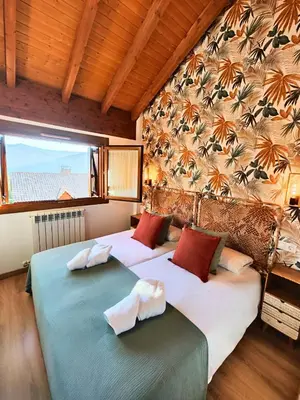 Cama o camas de una habitación en El Balcón de Gavín