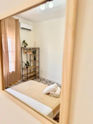 Cama o camas de una habitación en Piso Reformado con Historia en cada Rincon-Vive Zaragoza XIV