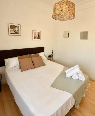 Cama o camas de una habitación en Tu Refugio en Zaragoza - Vive Zaragoza IX