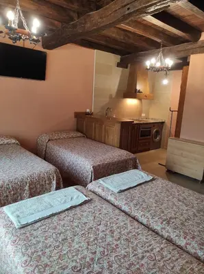 Cama o camas de una habitación en Sagardikoetxea HABITACIONES CON BAÑO EN CASA RURAL