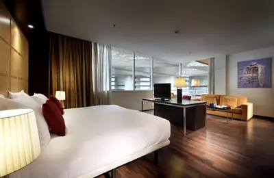 Cama o camas de una habitación en Eurostars Zaragoza