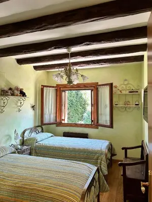 Cama o camas de una habitación en El Pueyo de Jaca