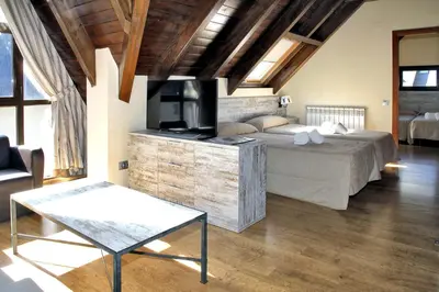 Cama o camas de una habitación en Aparthotel La Vall Blanca