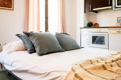 Cama o camas de una habitación en Balloon House Casco Antiguo WiFi 4 Pax Nespresso